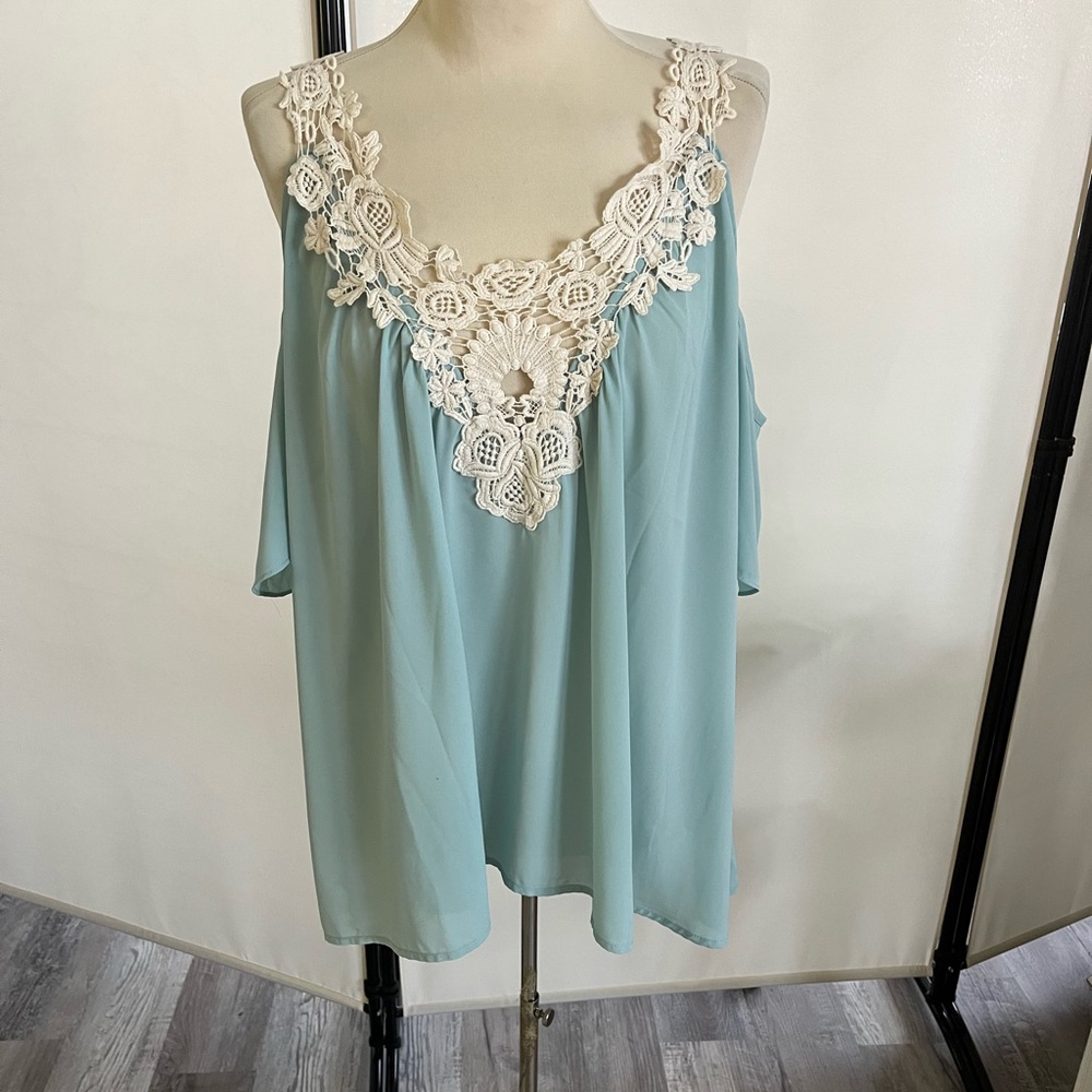 Have v neck cold shoulder, silky top